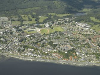 General oblique aerial view centred on the town, taken from the E.