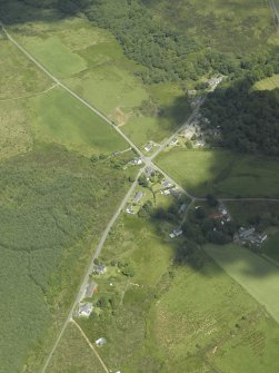 Oblique aerial view centred on the township and village, taken from the SE.