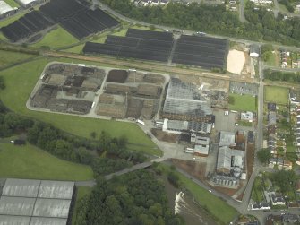 Oblique aerial view.  Cambus, Cambus Distillery and Stirling to Alloa railway from SSW.