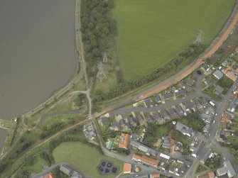 Oblique aerial view.  Kincardine-on-Forth, reconstruction works for rebuilding railway from Alloa, Station Road, railway station and Station House from NNE.