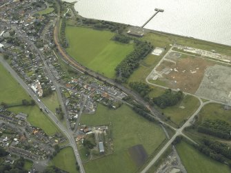 Oblique aerial view.  Kincardine-on-Forth, reconstruction works for rebuilding railway from Alloa, Station Road, Ochil View and Hawkhill Road from NW.