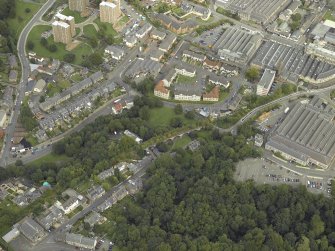 Oblique aerial view centred on central Dunfermline,  Pilmuir works and Bruce Street, taken from the SW.