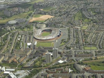 General oblique aerial view centred on the stadium, taken from the WSW.