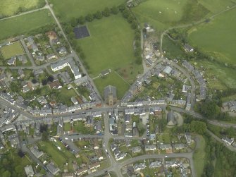 Oblique aerial view of the town centred on the churches, taken from the SW.