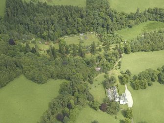 General oblique aerial view centred on the country house, walled garden and garden house, taken from the WSW.