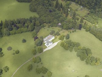 General oblique aerial view centred on the country house with the walled garden adjacent, taken from the S.