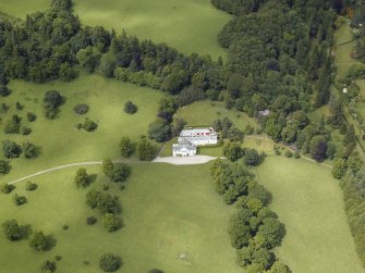 Oblique aerial view centred on the country house, taken from the SSE.