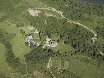 Oblique aerial view centred on the hotel, cottage and golf course, taken from the W.