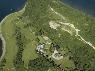 Oblique aerial view centred on the hotel, cottage and golf course, taken from the WSW.