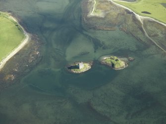 Oblique aerial view centred on the castle, taken from the NNW.