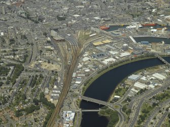 General oblique aerial view of Aberdeen taken from the South,centred Queen Elizabeth Bridge, Victoria Bridge and Wellington Suspension Bridge.