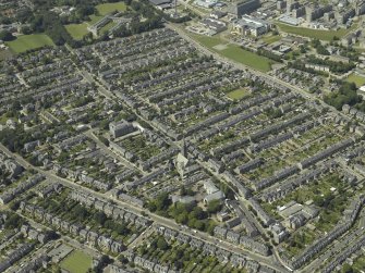 General oblique aerial view of the Rosemount area of the city centred on the church, taken from the ESE.