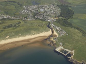 General oblique aerial view centred on the villages and harbour, taken from the S.