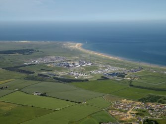 General oblique aerial view centred on the gas terminal, taken from the SW.