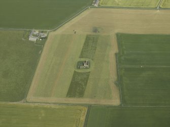 Oblique aerial view centred on the remains of the castle, taken from the SW.