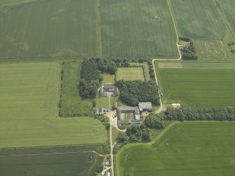 Oblique aerial view centred on the country house and garden, taken from the N.