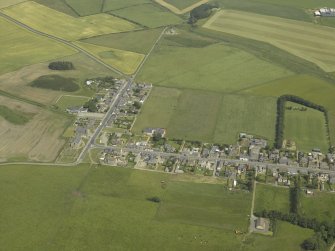 General oblique aerial view centred on the village, taken from the W.