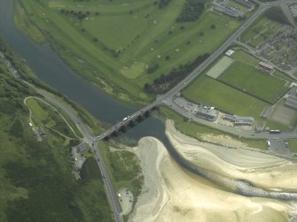 Oblique aerial view centred on the road bridge with the gate-lodge adjacent, taken from the NE.