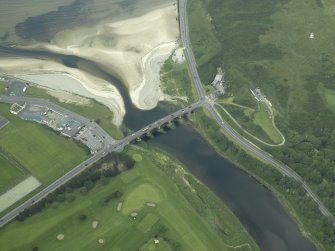 Oblique aerial view centred on the road bridge with the gate-lodge adjacent, taken from the SW.