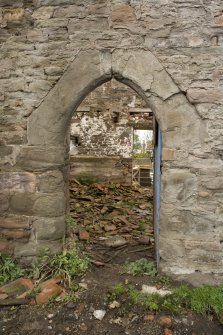 Abbey barn, detail of arched doorway on S wall