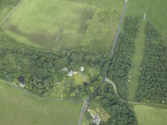 Oblique aerial view centred on the tower-house and house, taken from the SE.