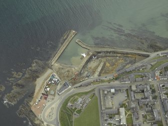 Oblique aerial view centred on the harbour, taken from the WSW.