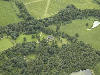 General oblique aerial view centred on the castle, taken from the NW.