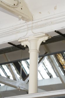 Interior. Ground floor. Cutting room. Detail of cast-iron column showing tapered Tuscan-style order of the capital and the integral flanges to allow it to be attached to the beam above. The construction of the main working areas are of the same design.