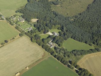 Oblique aerial view centred on the country house, taken from the S.