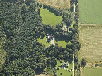 Oblique aerial view centred on the country house, taken from the NW.