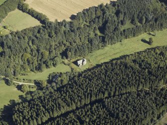 Oblique aerial view centred on the church, taken from the SW.