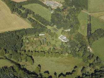 Oblique aerial view centred on the country house and park, taken from the SSE.
