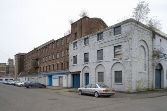 Falfield Street.  View from NE showing main mill building and engine house (painted pale blue).