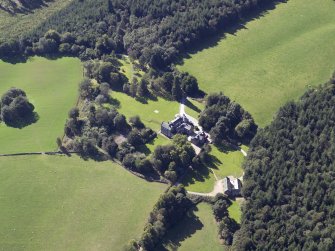 Oblique aerial view centred on the country house, hotel and hall-house, taken from the ENE.