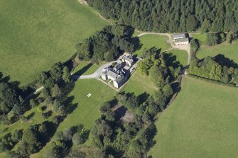 Oblique aerial view centred on the country house, hotel and hall-house, taken from the S.