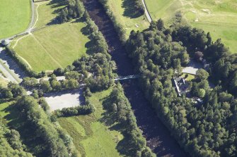 Oblique aerial view centred on the road bridge and lodge, taken from the NNW.