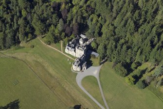 Oblique aerial view centred on the country house, taken from the SSW.