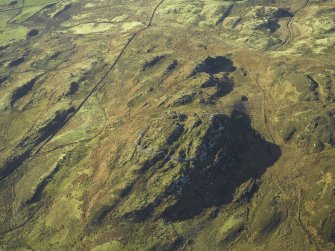 Oblique aerial view centred on the remains of the fort, taken from the ENE.