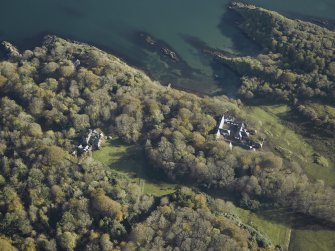Oblique aerial view centred on the country house and house, taken from the W.
