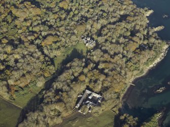 Oblique aerial view centred on the country house and house, taken from the SSE.