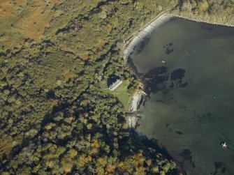 Oblique aerial view centred on the house, taken from the S.