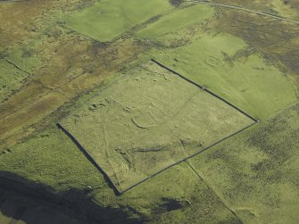 Oblique aerial view centred on the remains of the township, taken from the NW.