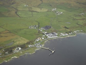 General oblique aerial view centred on the village, taken from the SE.