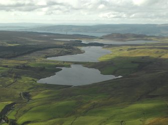 General oblique aerial view centred on the reservoirs, taken from the E.