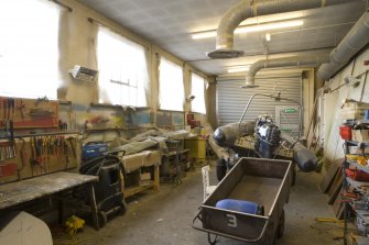 Interior.  Boat repair hangar showing workshop area.