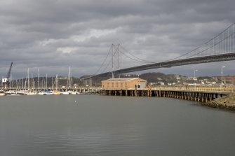 View.  From SW showing E pier, Loop Shed and crane.