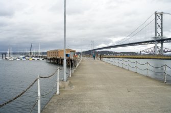 View.  From S along E pier with Loop Shed in mid-distance.