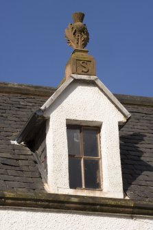 Detail of dormer window and finial