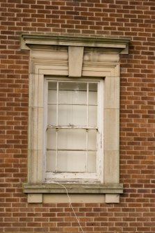 Detail.  Window with moulded architrave and keystone on S elevation of Main Sandhurst Barrack Block.