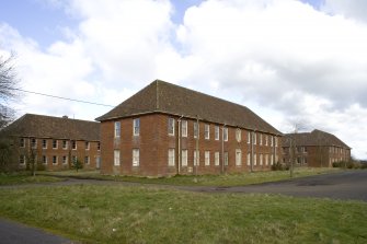 View.  Main Sandhurst Barrack Block S elevation and W end from SW.